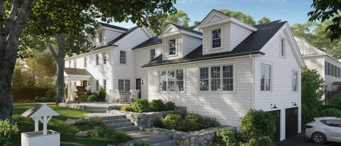 Front view of the restored white clapboard Colonial in Needham with black roof, dormers, stone walls, granite steps and the restored wishing well on the lawn