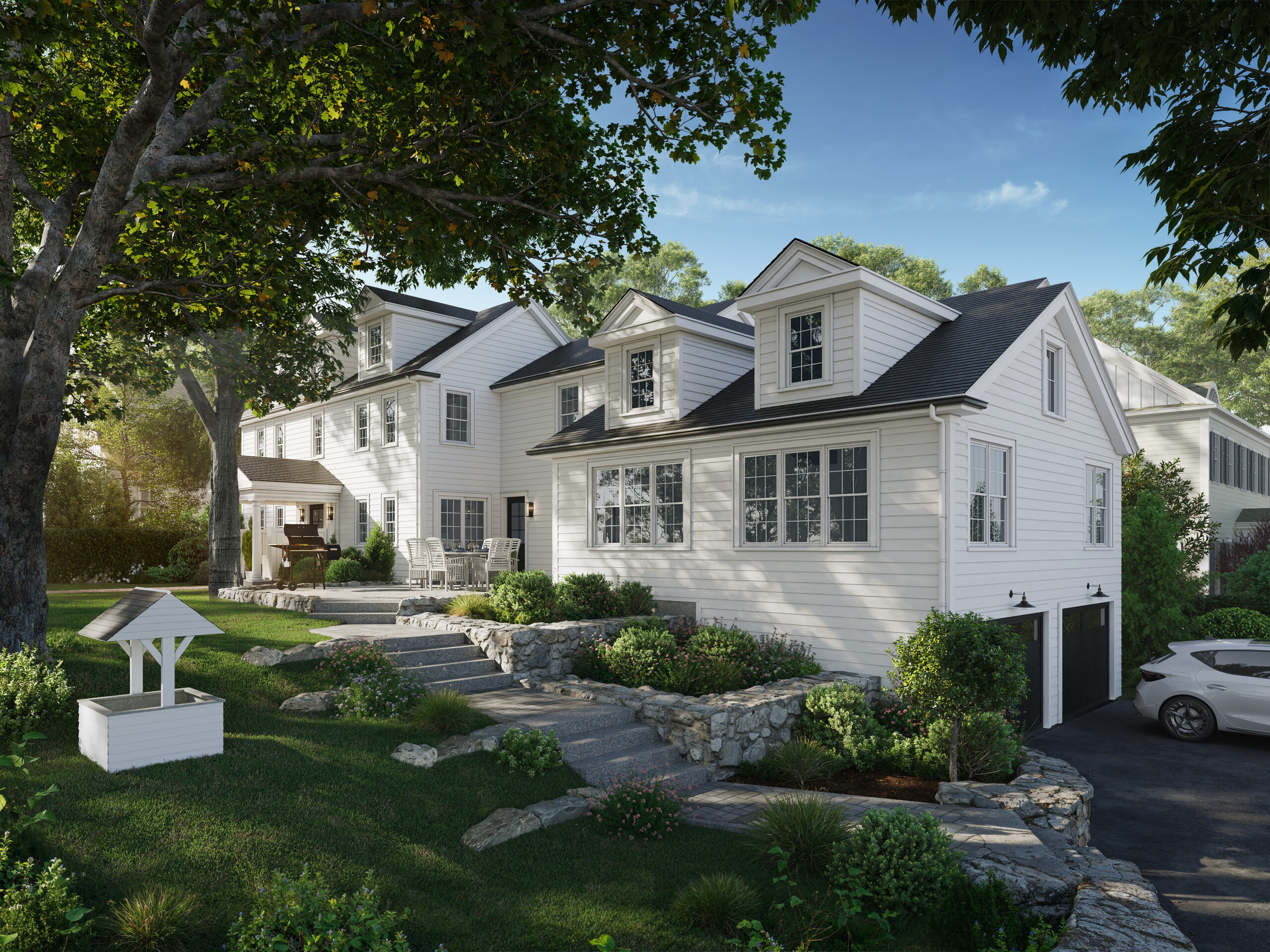 Front view of the restored white clapboard Colonial in Needham with black roof, dormers, stone walls, granite steps and the restored wishing well on the lawn